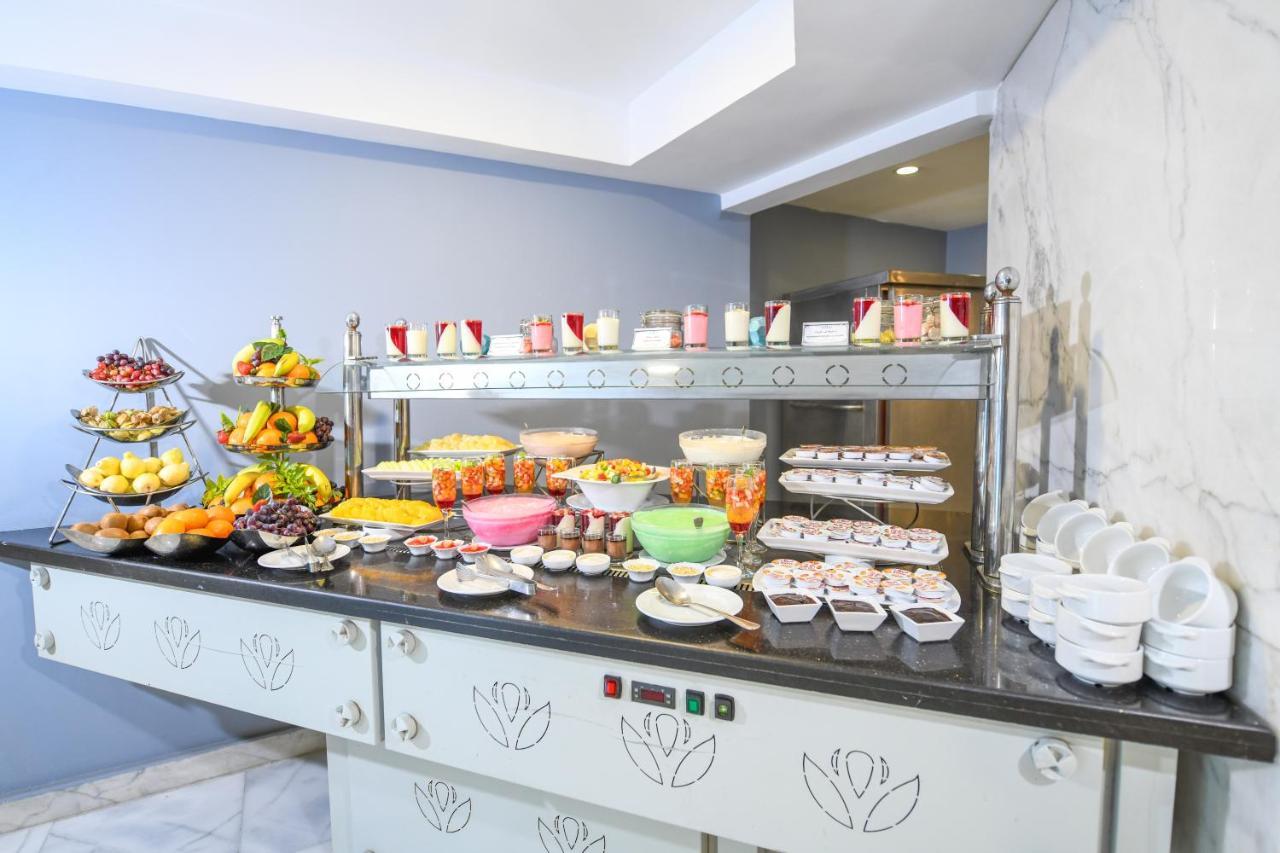 فندق توليب الجلاء القاهرة المظهر الخارجي الصورة A buffet at a hotel